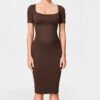 Square neck knitted dress female autumn and winter new solid color senior sense of temperament within the Slim package hip long skirt